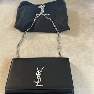 Saint Laurent Kate medium YSL bag in grained leather with palladium